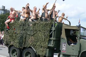 Bears and big boys in their army truck.