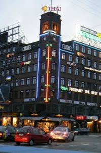 Central Square lights and shops with bicycle clock tower.