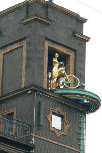 Detail of clock tower with the golden lady.