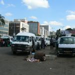 Harare: downtown business district - minibus taxi terminal