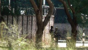 Walls with barbed wire surround the presidential mansion. Guarded by