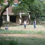 Local kids playing cricket. Despite the government's defiance and dislike
