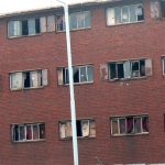 Close-up view of a derelict apartment block in a poor