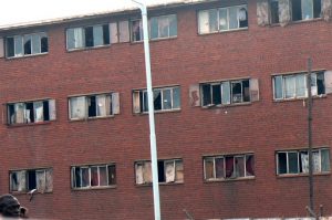 Close-up view of a derelict apartment block in a poor