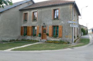 A tidy house on a corner in St Juvin. In