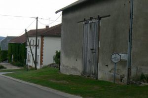 Barn/garages are made of brick with a stucco covering, Not