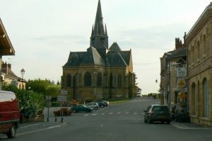 Main street of Grandpre with church of St Medard, center,