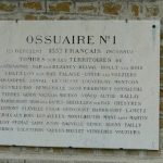 A triple ossuary is located at the back of the