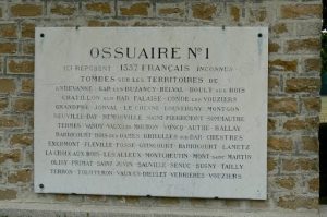 A triple ossuary is located at the back of the