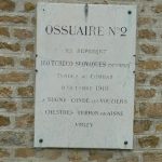 A triple ossuary is located at the back of the