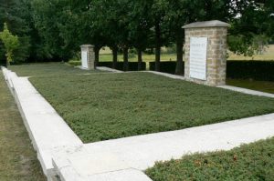 A triple ossuary is located at the back of the