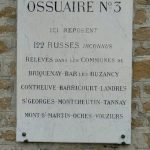 A triple ossuary is located at the back of the