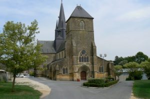 Church of St Medard, center, a former Augustinian priory variously