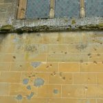Bullet holes in the church wall.