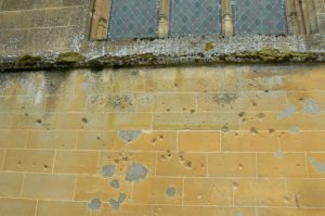 Bullet holes in the church wall.