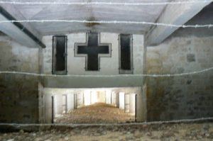 Inside the memorial structure is the actual trench filled in