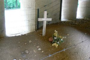 Inside the memorial structure is the actual trench filled in