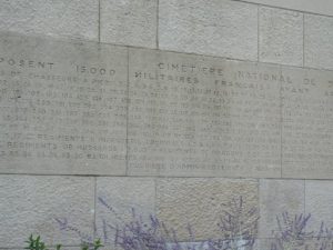 Stone wall inscription at the National cemetery