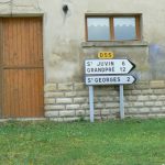 Road signs to other former battlefield villages, now peaceful