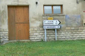 Road signs to other former battlefield villages, now peaceful