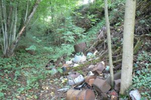 Modern trash dumped in the ravine