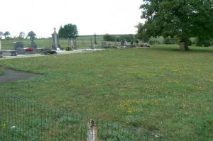 Modern graves in the St George cemetery looking west; note