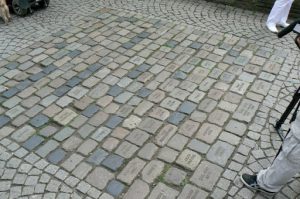 Cologne cobblestone memorial remembering victims of the AIDS epidemic, located