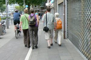 Two lesbian couples walking home in central Cologne