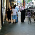 Meanwhile, an Arab family wanders around central Cologne; whether they