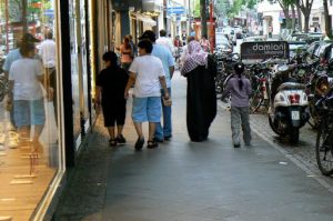 Meanwhile, an Arab family wanders around central Cologne; whether they