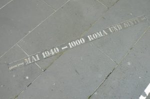 Throughout Cologne there are embedded brass sidewalk markers designating places