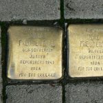 Throughout Cologne there are embedded brass sidewalk markers designating places