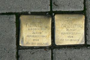 Throughout Cologne there are embedded brass sidewalk markers designating places
