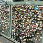 Locks (thousands) hooked to a fence on the Hohenzolern railway