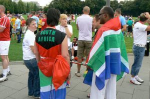 Athletes gather outside to form the procession to enter the