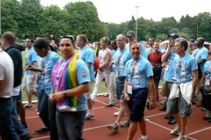 Athletes (from Long Beach, California) gather outside to form the