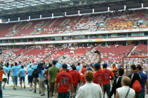 Procession of athletes from 40 nations entering the RhineEnergie stadium