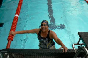 Happy swimmer Andrea at the end of her race