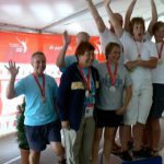 Team Long Beach relay swim team (left) celebrates their medals