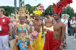 Athletes from Thailand gather outside to form the procession to