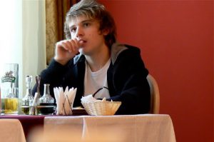 A pensive British student at the language school