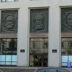 Marx, Engels and Lenin reliefs on office facade
