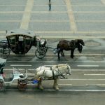 Outside the Hermitage are period carriages and characters for tourists.