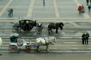 Outside the Hermitage are period carriages and characters for tourists.