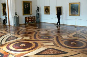 Each room has a unique parquet floor pattern