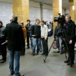 TV reporters in the subway
