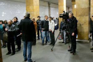 TV reporters in the subway