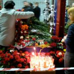 Flower memorials appeared immediately in the stations soon after train