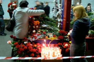 Flower memorials appeared immediately in the stations soon after train