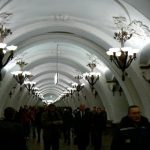 Moscow subway station with floral chandeliers.